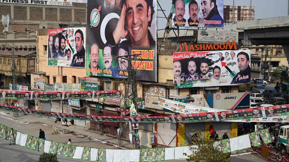 A street plastered with election advertising in Rawalpindi, Pakistan.  The country will elect a new parliament on Thursday - just one of more than 60 elections worldwide this year.